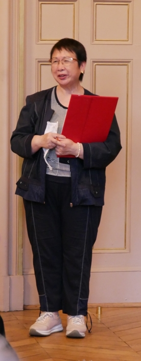 Yen Kuan, attachée de direction